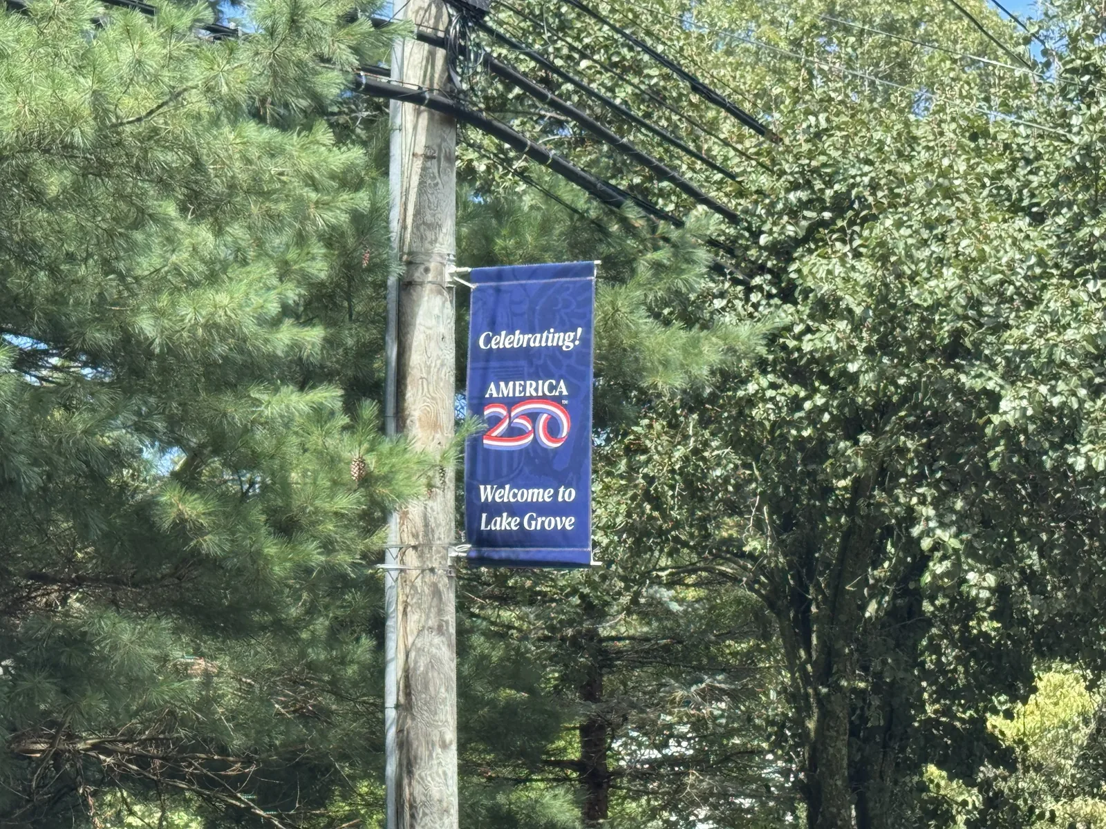 Welcome to Lake Grove banner in the Village of Lake Grove, New York